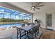 Outdoor patio with comfortable seating and a barbecue, perfect for relaxing and enjoying the outdoors at 5981 Sierra Crown St, Mount Dora, FL 32757