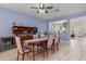 Dining room with breakfast bar and open floor plan at 690 Cascading Creek Ln, Winter Garden, FL 34787