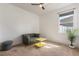 Living room with bright natural light and modern accents at 690 Cascading Creek Ln, Winter Garden, FL 34787