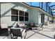 Covered patio showcasing comfortable seating area perfect for entertaining at 690 Cascading Creek Ln, Winter Garden, FL 34787