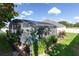 Enclosed pool area with lush greenery offering privacy and a refreshing escape at 690 Cascading Creek Ln, Winter Garden, FL 34787