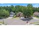 An aerial view shows the property, neighborhood, and surrounding landscaping at 1111 Brielle Ct, Oviedo, FL 32765