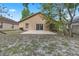Backyard view with a patio and the back of the home at 1111 Brielle Ct, Oviedo, FL 32765
