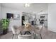 Eat-in kitchen with gray cabinetry, stainless steel appliances, and a cozy dining area, perfect for casual meals at 1111 Brielle Ct, Oviedo, FL 32765