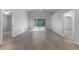 This large living room has a sliding glass door and two entryways at 1111 Brielle Ct, Oviedo, FL 32765