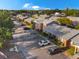 Aerial view of a well-maintained apartment complex and neighborhood featuring mature landscaping and ample parking at 1227 Carriage Ln, Orlando, FL 32807