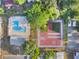 Aerial shot of community amenities, including a pool, basketball court, and playground at 1227 Carriage Ln, Orlando, FL 32807