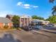 Well-maintained brick apartment complex with ample parking and mature landscaping in a beautiful residential neighborhood at 1227 Carriage Ln, Orlando, FL 32807
