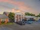 Charming brick apartment building featuring a well-maintained exterior, parking, and a welcoming facade at 1227 Carriage Ln, Orlando, FL 32807