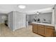 Open-concept kitchen area with a double closet and ample cabinetry for storage at 1227 Carriage Ln, Orlando, FL 32807