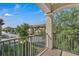 Enjoy beautiful balcony view of townhomes and a scenic streetscape from this lovely townhome balcony at 1339 Shinnecock Hills Dr, Davenport, FL 33896
