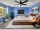 Main bedroom featuring a ceiling fan, natural light from the window and an ensuite bathroom at 13839 Fairway Island Dr # 1128, Orlando, FL 32837