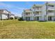 Back of condo features multi-story balconies with stunning views of well-manicured grounds at 13839 Fairway Island Dr # 1128, Orlando, FL 32837
