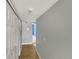 Hallway with closet and tile flooring leading to bedroom at 13839 Fairway Island Dr # 1128, Orlando, FL 32837