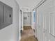 Hallway with tile floors and white doors, leading to other rooms at 13839 Fairway Island Dr # 1128, Orlando, FL 32837