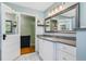 Beautiful bathroom features a modern vanity and ample storage space at 1405 Pioneer Trl, New Smyrna Beach, FL 32168