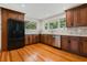 Spacious kitchen featuring stainless steel appliances, granite countertops, and ample storage space at 1405 Pioneer Trl, New Smyrna Beach, FL 32168