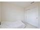Bedroom with sliding closet doors and bed at 14374 Lanikai Beach Dr, Orlando, FL 32827