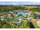 Overhead view of the impressive water park at the resort featuring pools and waterslides at 14501 Grove Resort Ave # 3335, Winter Garden, FL 34787