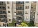 Building facade with many balconies perfect for enjoying the views and outdoor living at 14501 Grove Resort Ave # 3335, Winter Garden, FL 34787