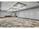 Spacious ballroom with elegant lighting, patterned carpet, and neutral decor for versatile event styling at 14501 Grove Resort Ave # 3335, Winter Garden, FL 34787