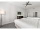 Well-lit bedroom features two queen-sized beds, modern decor, and a contemporary ceiling fan at 14501 Grove Resort Ave # 3335, Winter Garden, FL 34787