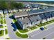 Charming townhome with screened in pool, lush landscaping, and convenient parking in a Gathering-friendly community at 1624 Tropical Palms Cir, Kissimmee, FL 34747