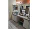 Bathroom vanity area with double mirrors at 1639 Nestlewood Trl, Orlando, FL 32837