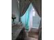 Bathroom featuring a vanity and shower/tub with decorative curtain at 1639 Nestlewood Trl, Orlando, FL 32837