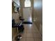 Inviting foyer featuring neutral tile flooring and decorative elements at 1639 Nestlewood Trl, Orlando, FL 32837