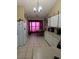 Bright kitchen with white cabinets and a breakfast nook at 1639 Nestlewood Trl, Orlando, FL 32837