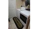 Functional laundry room with modern washer and dryer at 1639 Nestlewood Trl, Orlando, FL 32837