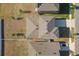 Birds eye view of a home showing the roofline and surrounding fenced in back yard at 1830 Juneberry St, Clermont, FL 34715
