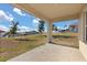A view of backyard featuring grass area and fence at 1830 Juneberry St, Clermont, FL 34715