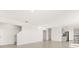 Open-concept living space with tile floors at 1830 Juneberry St, Clermont, FL 34715