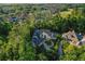 Expansive home boasts a private circular drive, lush landscaping, and a stunning golf course view at 1906 Oakbrook Dr, Longwood, FL 32779