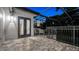 Inviting covered balcony with outdoor seating and elegant iron railings, great for entertaining at 1906 Oakbrook Dr, Longwood, FL 32779
