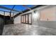 Covered balcony with tile flooring, iron railing, and outdoor lighting, perfect for relaxing evenings at 1906 Oakbrook Dr, Longwood, FL 32779