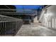 Spacious covered balcony with tile flooring, iron railing, and ambient lighting at 1906 Oakbrook Dr, Longwood, FL 32779