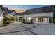 Elegant home with a long driveway, covered parking, and lush landscaping at 1906 Oakbrook Dr, Longwood, FL 32779