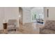 Grand foyer featuring tile floors, elegant lighting, and arched doorways leading to other rooms at 1906 Oakbrook Dr, Longwood, FL 32779