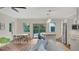 Inviting living space with an island, breakfast nook, neutral tones, and natural light at 1906 Oakbrook Dr, Longwood, FL 32779