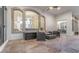 Inviting outdoor living space with stone flooring, stylish furniture, and seamless access to the home's interior at 1906 Oakbrook Dr, Longwood, FL 32779