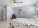 Bright main bedroom with a ceiling fan and neutral color palette at 1912 Wyandotte Trl, Casselberry, FL 32707