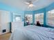 Bright bedroom with a cat tree next to the windows, a dresser, and a desk, making it the perfect retreat at 2147 Whitfield Ln, Orlando, FL 32835