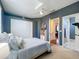 Calm bedroom with gray walls, white trim, and closet space at 2147 Whitfield Ln, Orlando, FL 32835