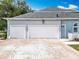 This home features a three car garage, providing plenty of space for vehicles and storage at 2147 Whitfield Ln, Orlando, FL 32835