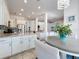 Open concept kitchen with stainless steel appliances and a breakfast nook at 2147 Whitfield Ln, Orlando, FL 32835