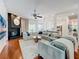 Bright and airy living room with hardwood floors, fireplace, and open-concept design at 2147 Whitfield Ln, Orlando, FL 32835