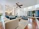 Bright living space featuring hardwood floors, an open layout, and modern decor at 2147 Whitfield Ln, Orlando, FL 32835
